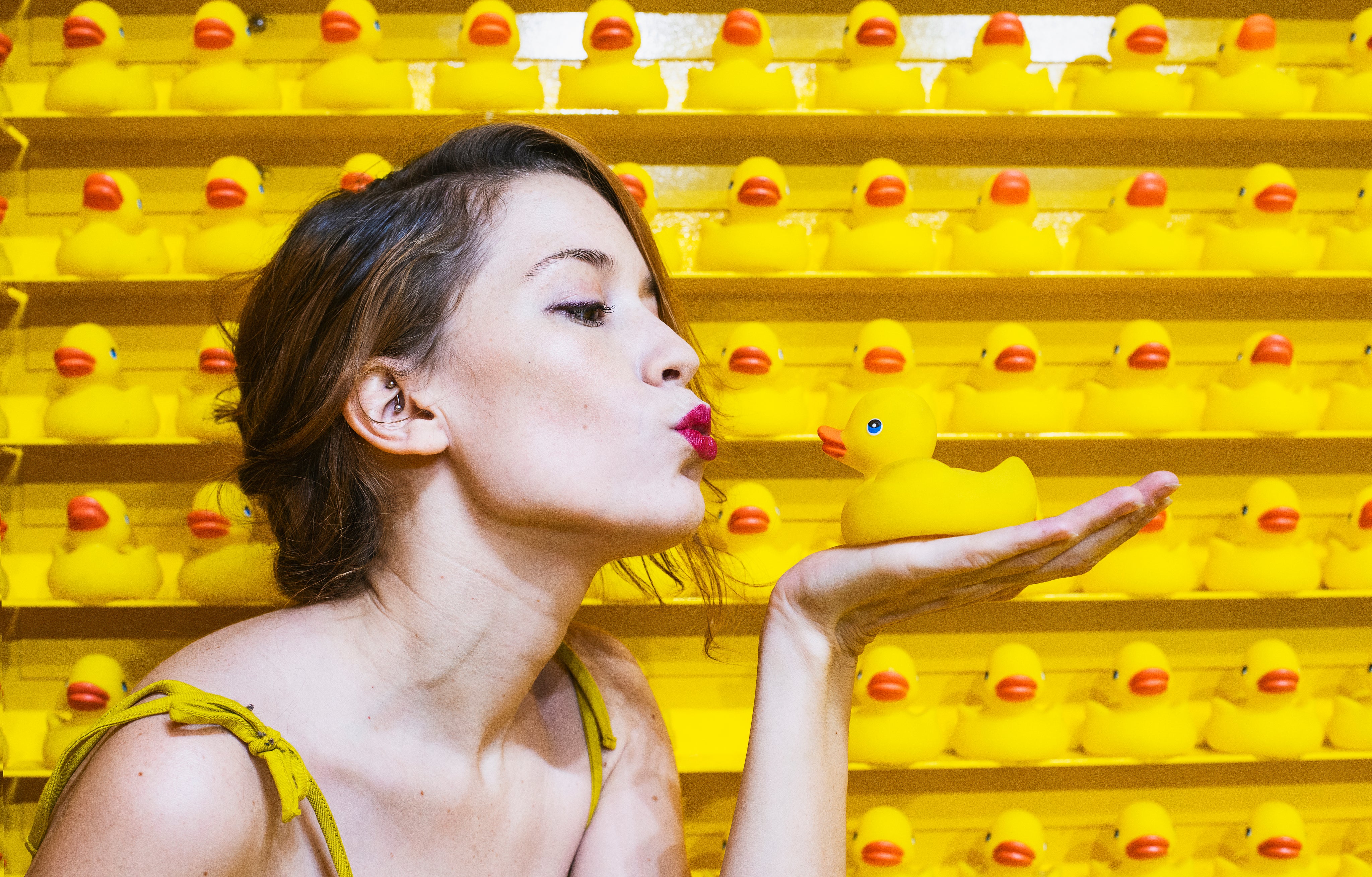 files/young-woman-blowing-kiss-to-rubber-duck.jpg